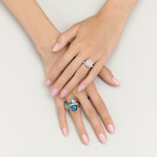 PAB4010_O6000_DB0OY_110_Pomellato_ring-nudo-rose-gold-18kt-white-gold-18kt-blue-topaz.jpg